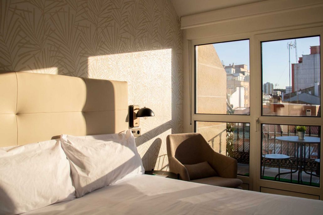 Dormitorio con terraza